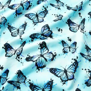 Bomuldsjersey Butterfly Splashes | Glitzerpüppi – isblå, 