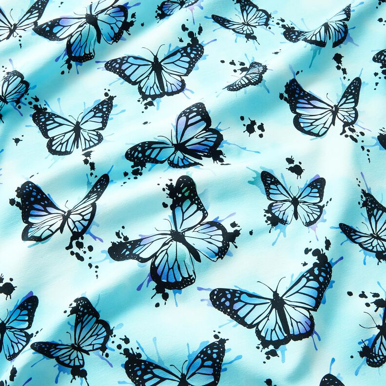 Bomuldsjersey Butterfly Splashes | Glitzerpüppi – isblå,  image number 1